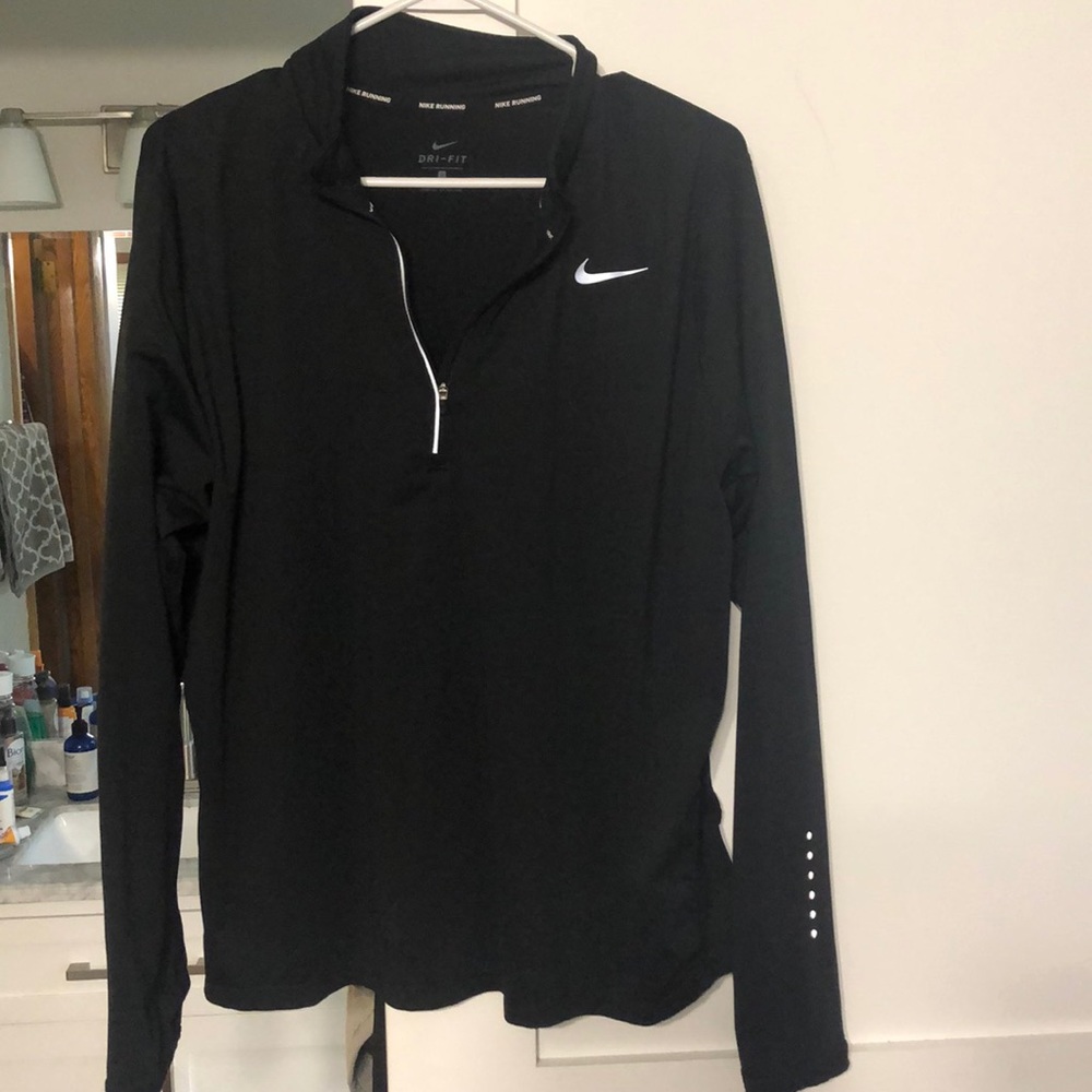 Gently worn woman’s Nike black pullover